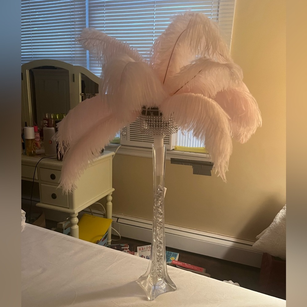 Pink Feathered Lamp with glass base and crystal balls within the base.